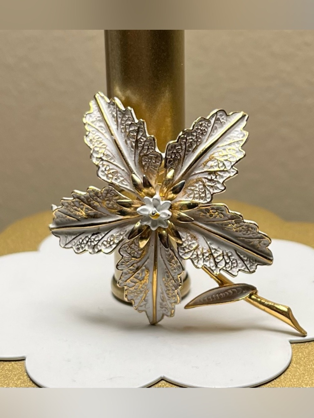 A.R.T signed Brooch with gold and white tones with slight articulation